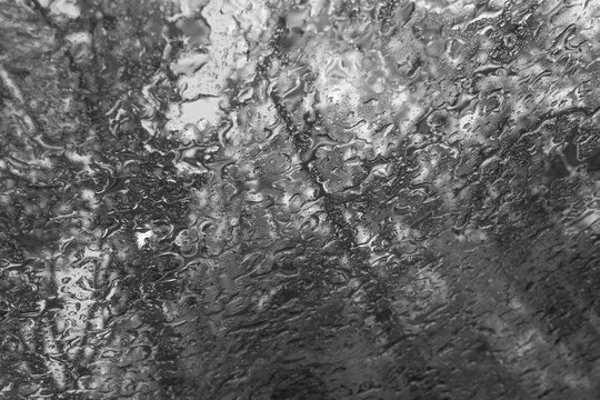 Abstract Rain Pattern on Glass Window in Black and White