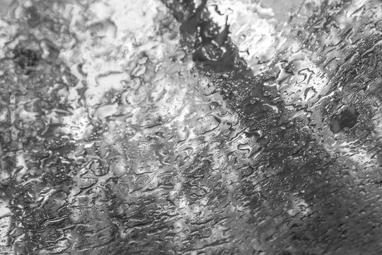 Abstract Rain Pattern on Glass Window in Black and White