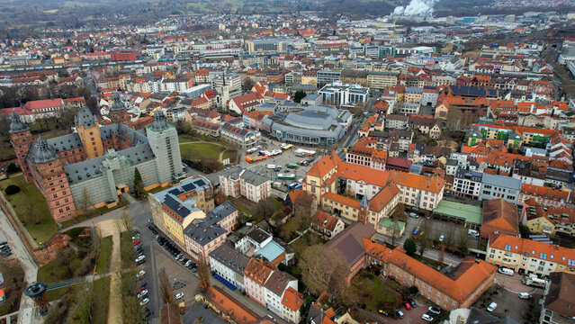 Aerial view around the old town of the city Aschaffenburg in Germany on a cloudy late winter day