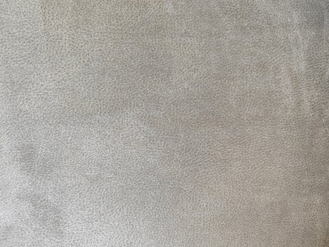 Light Grey Faux Leather Texture Close-up, Distressed Gray Nubuck Material Background, Luxurious Soft Velour Upholstery Surface, Abstract Artificial Leather Couch Backdrop, Premium Furniture Textile Ar