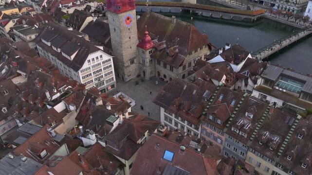 Lucerne City in Switzerland at Winter Time, Aerial Drone Shot of Old Town with Kapellbruecke and Wasserturm Luzern.