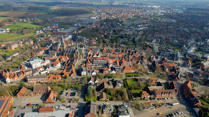 Obraz premium Aerial view beside the old town above the city Schüttorf in Germany, on a sunny afternoon in autumn.