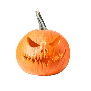 Carved Halloween pumpkin with a scary face isolated on a white background. Traditional jack o lantern cutout suitable for seasonal designs, decorations and holiday concepts