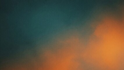 Fototapeta premium A soft, abstract gradient of deep teal and warm orange hues, creating a calming and atmospheric visual.