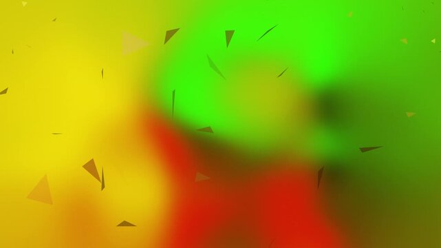 Vibrant, dynamic blurred background with green, yellow, and red shapes and black triangular particles. Suitable for  Juneteenth, freedom day, Black History Month, colorful, design, vibrant, modern
