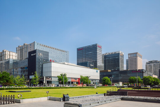Modern City Skyline and Commercial Shopping Buildings Overlooking Public Green Plaza in Xi'an, Shaanxi, China. SKP Xi&rsquo;an one of the world&rsquo;s largest luxury department store.