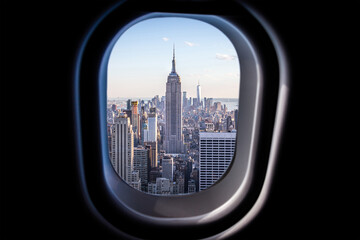 New York city view from plane window. View from a jet plane window high in the sky © Maria