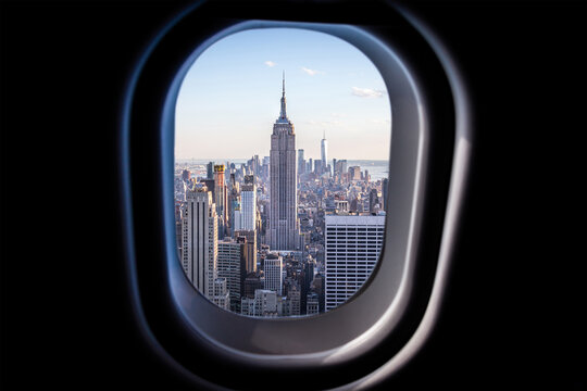 New York city view from plane window. View from a jet plane window high in the sky