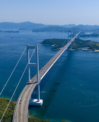 Vertical Aerial View of Kurushima Kaikyo Bridge and Island Seascape © Arakawa27