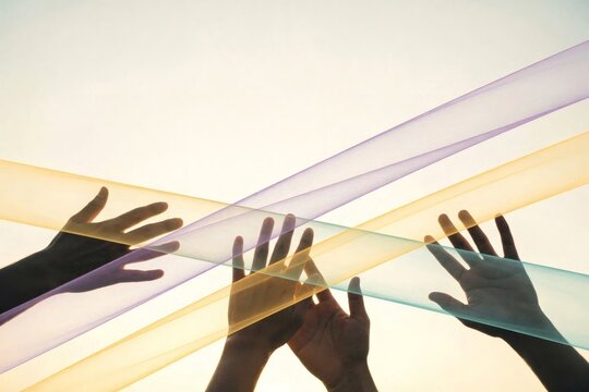 Atmospheric image of silhouetted hands intersecting in a beam of radiant light, representing anointing, spiritual renewal, and the restorative power of faith for editorial and ministry use.