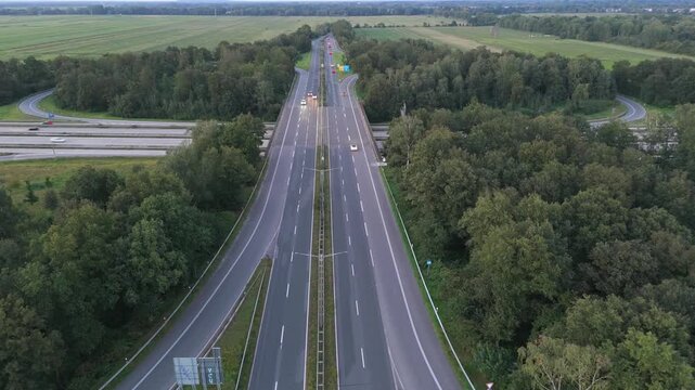 Autobahn highway diverging through forest aerial near Bremen Germany