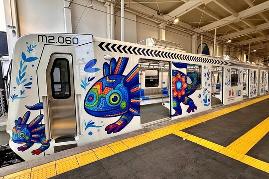 Light Rail with Blue Axolotl Artwork (Mexico City, CDMX, Mexico &ndash; June 13, 2026)