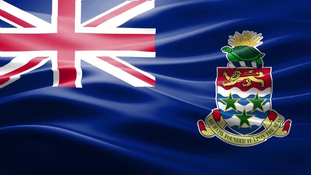 Waving National Flags of United Kingdom and Fiji on Blue Fabric Background Close Up