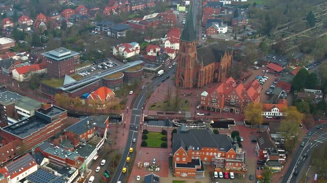Aerial view beside the old town above the city Papenburg in Germany, on a sunny noon in autumn.