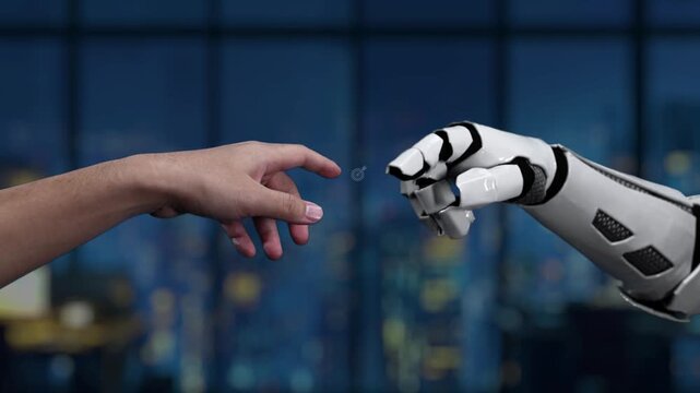 This image captures the symbolic interaction between human and robot hands, representing the integration of technology and artificial intelligence in a modern workspace. Synapse