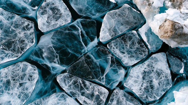Sea ice brash field aerial, frazil crystal and pancake ice formation mosaic, nilas film connecting floes, brine channel network visible in overcast diffuse polar light, oceanographic ice formation d