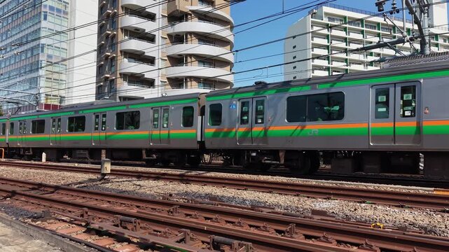 Tokyo, Japan - A commuter train passing through the city