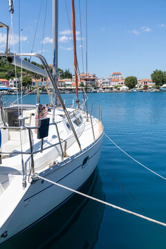 Sailing yacht moored in a coastal town harbor on Evia island Greece