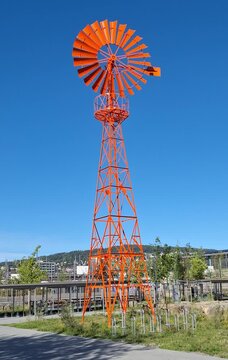 Windmill tower in the park somwer in Europe