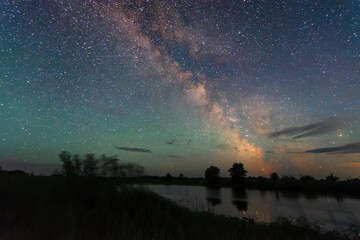 awesome night sky over the lake © Александр Арендарь