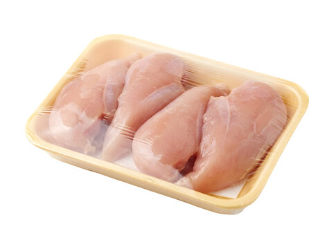Raw chicken breast fillets in a yellow tray wrapped in plastic isolated on transparent background