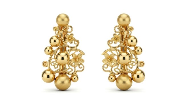 Pair of ornate gold filigree drop earrings on white.