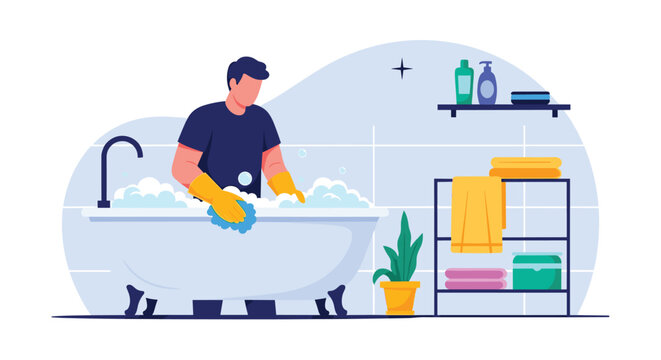 Professional man wearing yellow rubber gloves and using a sponge to clean a white bathtub filled with soap bubbles in a bathroom.