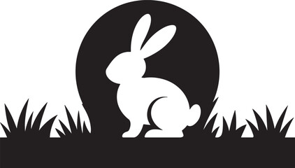 Obraz premium Black and white silhouette of a cute rabbit sitting in grass against a large full moon