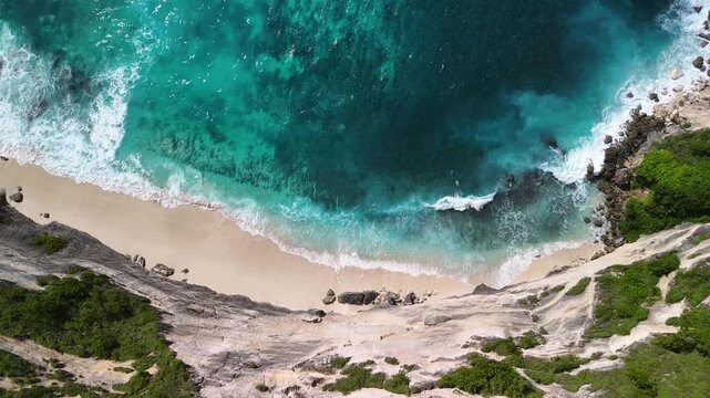 Turquoise ocean with sandy beach gradient aerial drone view Bali Indonesia