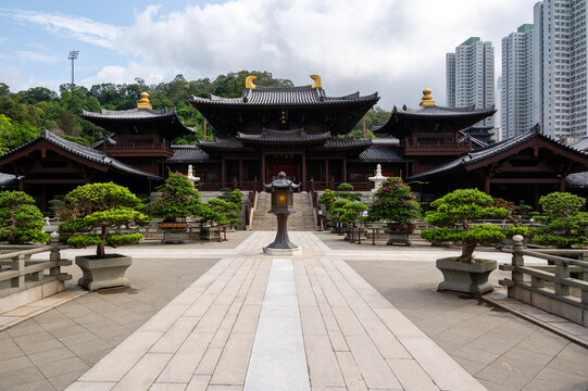 Symmetrical front view of the main hall courtyard at Chi Lin Nunnery in Diamond Hill, Hong Kong