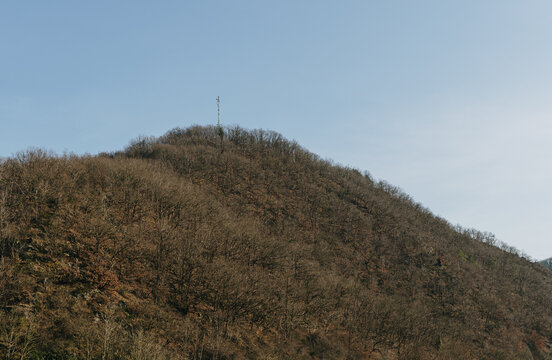 Beautiful view of the top of a wooded mountain in spring.