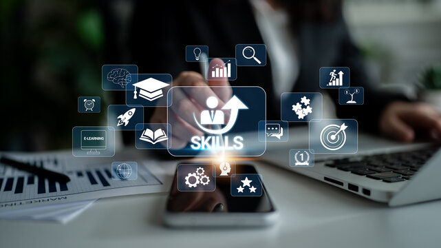 Concept of Skill Development with Digital Icons Representing Education, Growth, and Learning on a Modern Desk with a Smartphone and Laptop Quark.