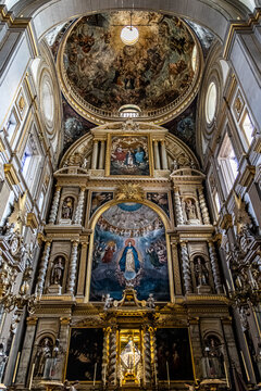 Ornate golden baroque altarpiece and painted dome interior of Puebla Cathedral, Mexico, colonial religious art