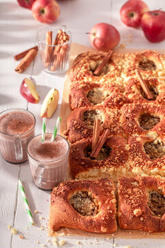 Homemade and sweet apple yeast cake as traditional breakfast snack.