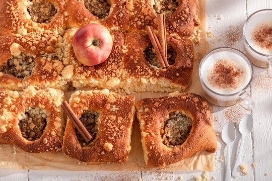 Delicious and hot apple yeast cake as traditional dessert.