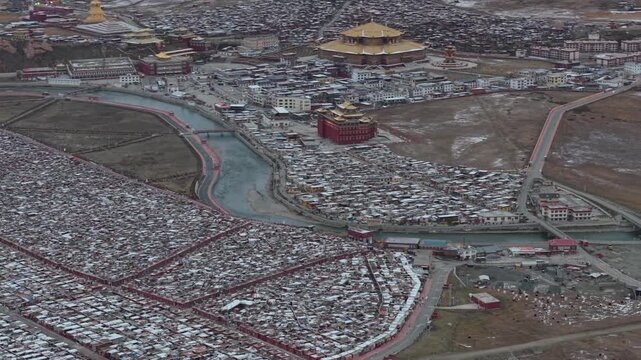 Aerial Pan Over Yarchen gar Monastery and Tibetan Buddhist Settlement in Winter