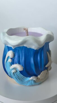 Handmade Marine Soy Candle in Gypsum Holder 360 Degrees Turntable Rotation Close Up High Angle