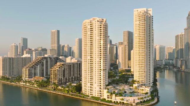 Aerial shot of the tall buildings in downtown Miami Florida at sunrise.