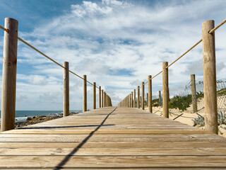 Fototapeta premium Wooden Boardwalk at Praia Mar e Sol in Miramar