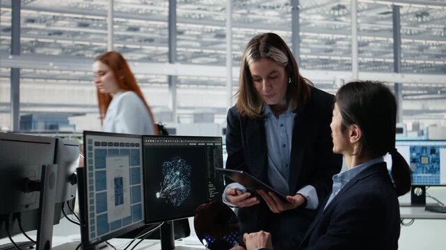 Engineering team doing semiconductor prototyping with AI in office for semiconductor research.