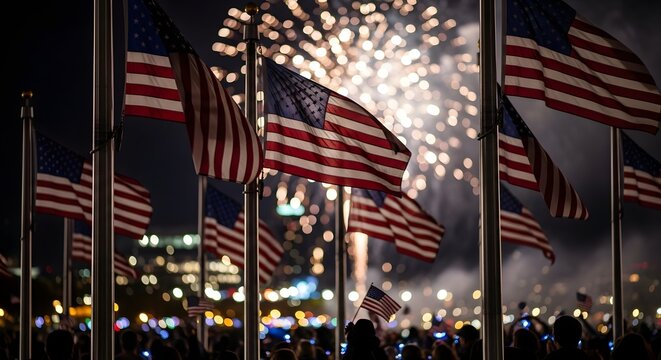 Multiple american flags waving during a night fireworks celebration
