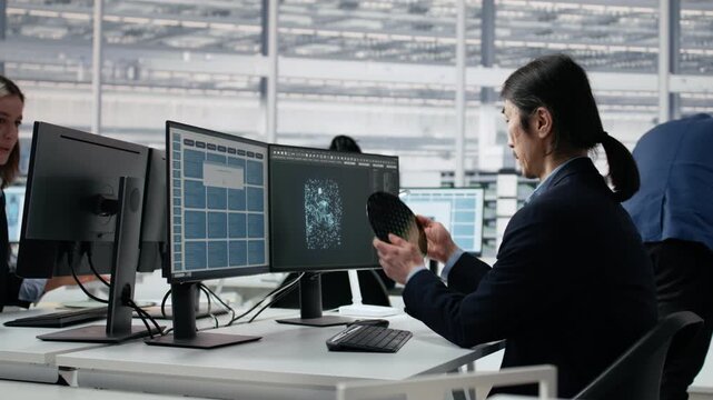 Using VR glasses, microchip circuit layout and engineer in industrial plant R&D office, improving semiconductor manufacturing, virtual reality technology and worker for semiconductor research.