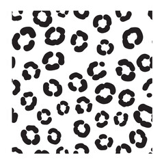Fototapeta premium Black and white abstract seamless pattern background with leopard spots animal print.