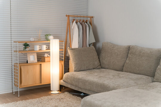 Sofa and floor lamp in the living room at night