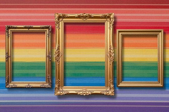 A set of three gold frames on a black background