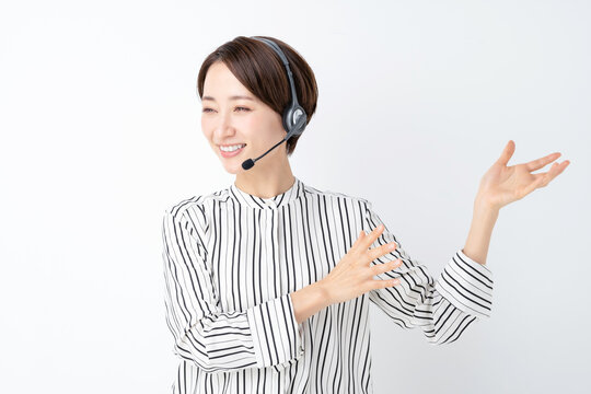 女性　ビジネス　セミナー　ヘッドセット