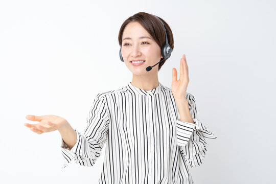 女性　ビジネス　セミナー　ヘッドセット