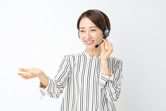 女性　ビジネス　セミナー　ヘッドセット