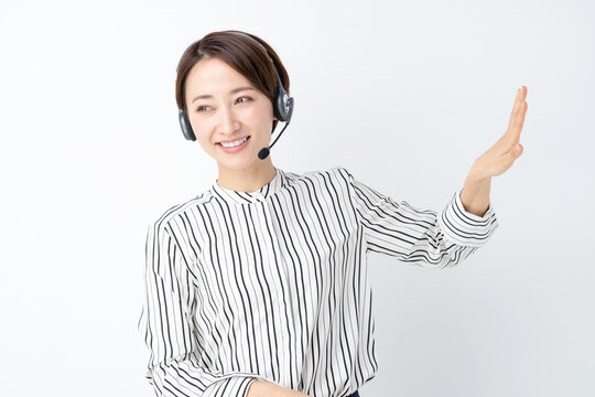 女性　ビジネス　セミナー　ヘッドセット