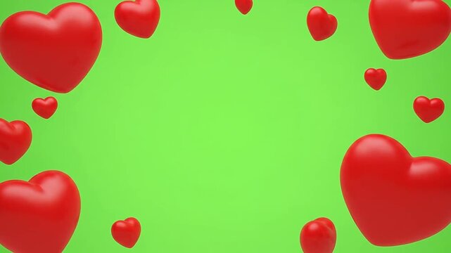 Floating red three dimensional hearts framing a bright green screen background
